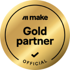 Flows Systems Make.com Gold Partner-badge, der viser virksomhedens ekspertise inden for workflow-automatisering og Make.com-integrationer